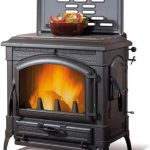 La Nordica Isotta con cerchi EVO Poêle à bois – 11,9 kW – Poêle massif en fonte avec plaque de cuisson – Classe d'efficacité énergétique A+ – Combustion haute efficacité – Design rustique